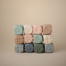 Mushie Dice Press Toy - Blush/Shifting Sands